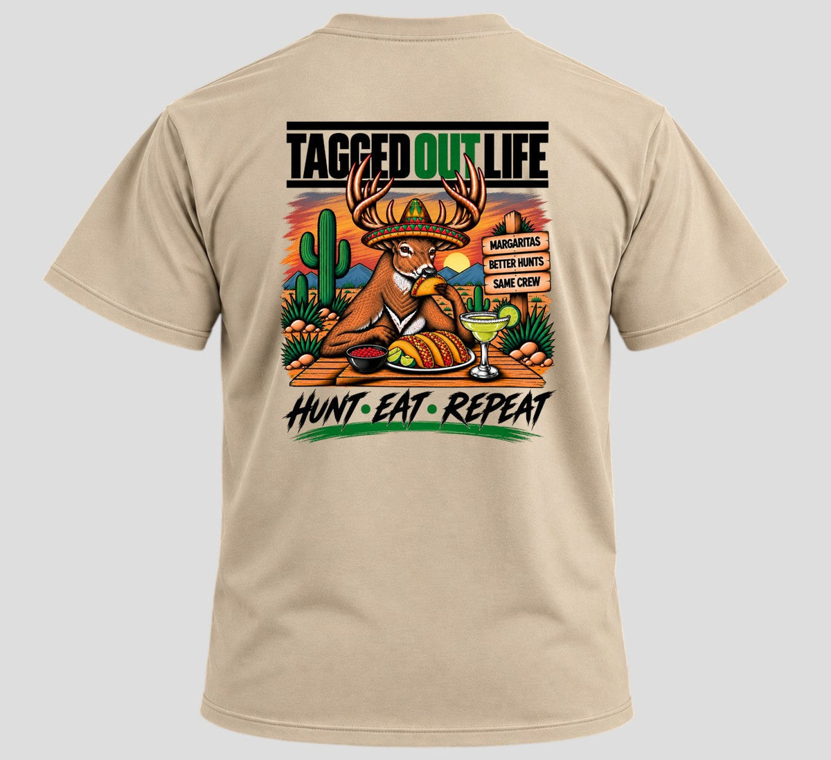 Tagged Out Life beige unisex short-sleeve t-shirt featuring a humorous deer graphic with a margarita and taco.