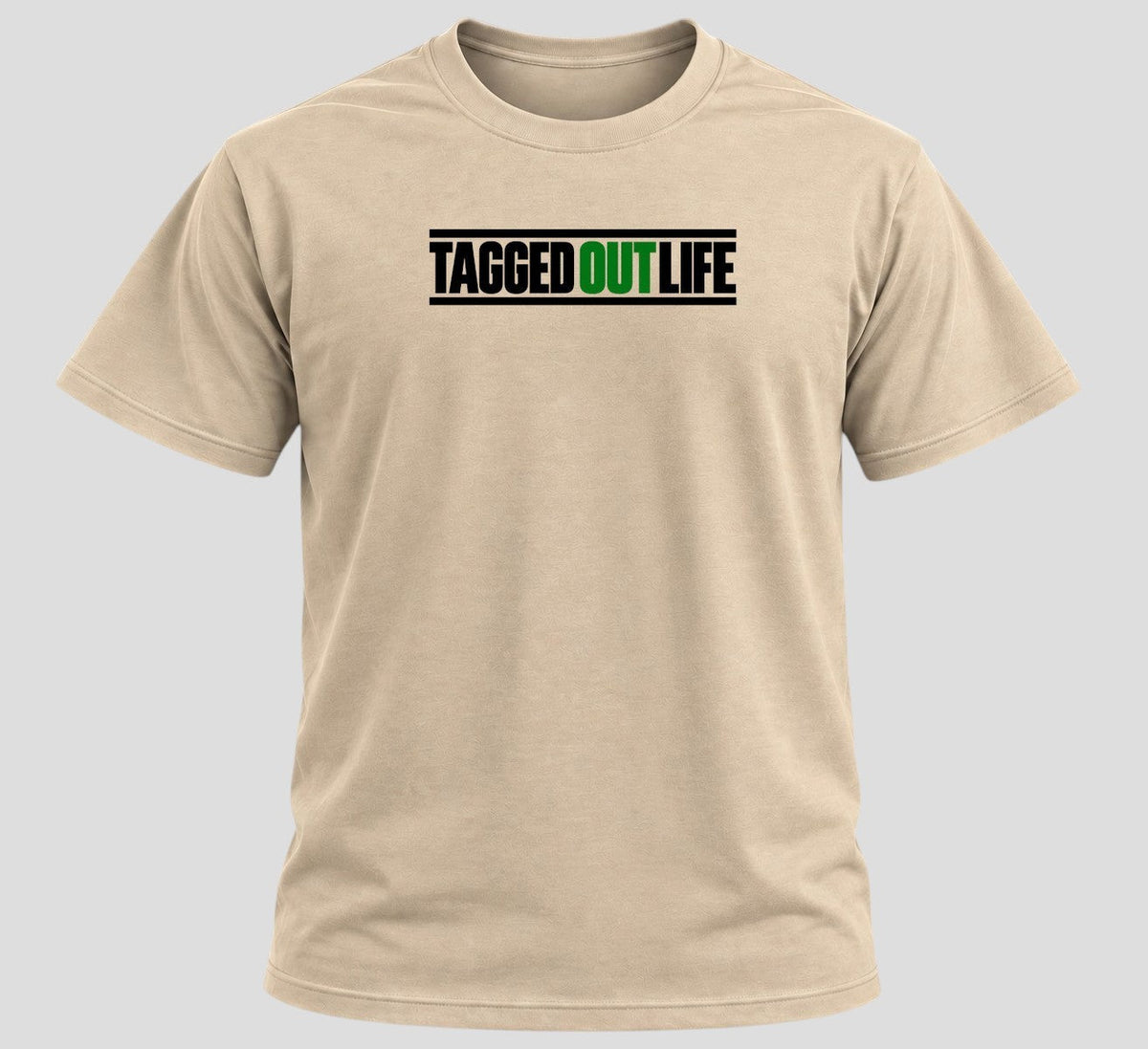 Tagged Out Life beige short-sleeve unisex hunting t-shirt with black and green logo graphic on the chest. margarita deer